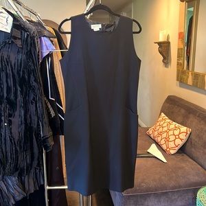 Must have… simple black, form fitting dress with pockets